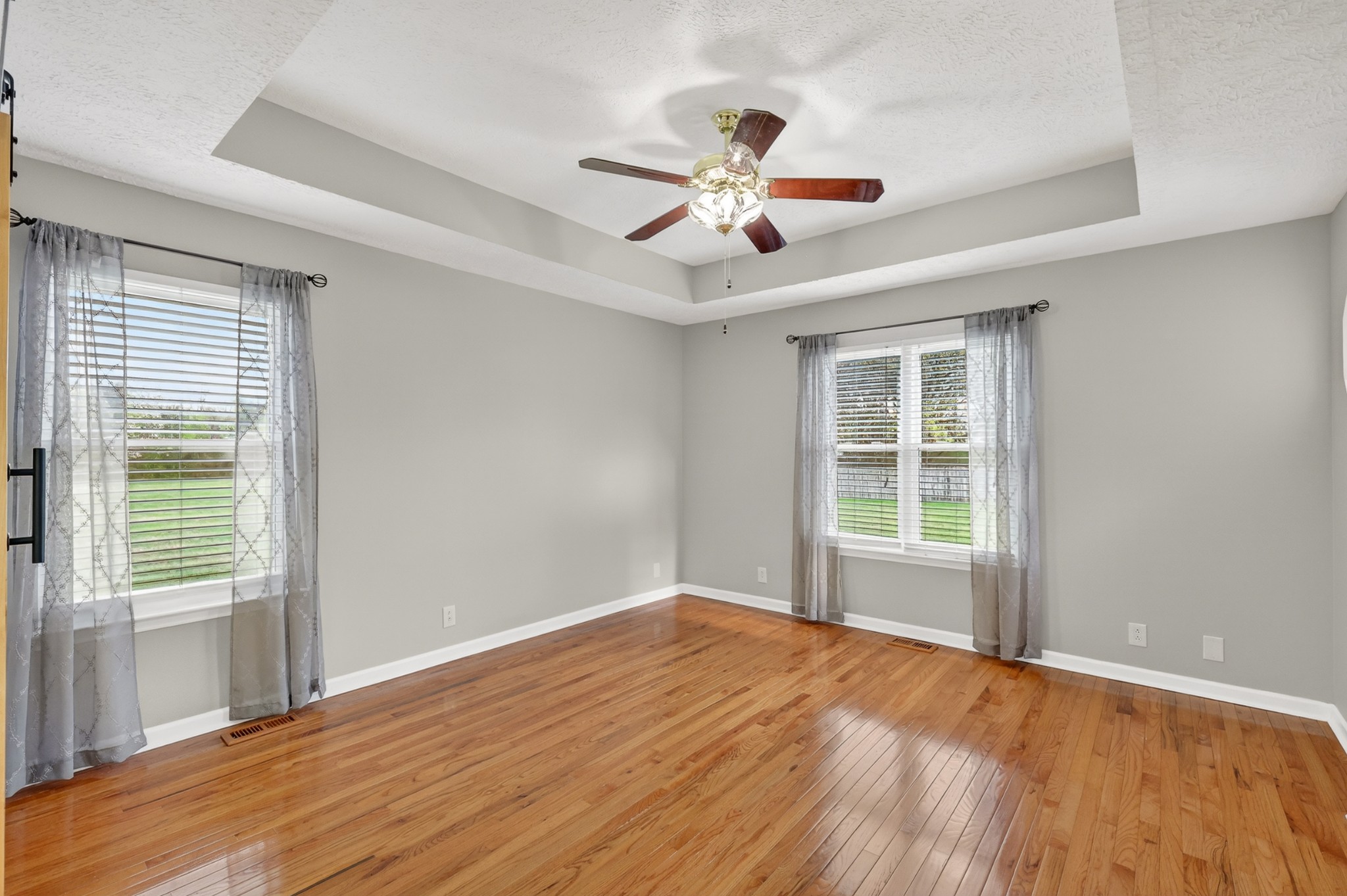 3145 Middleton Drive Rockvale, TN 37153 - Photo 15 of 50 a view of empty room with wooden floor and fan