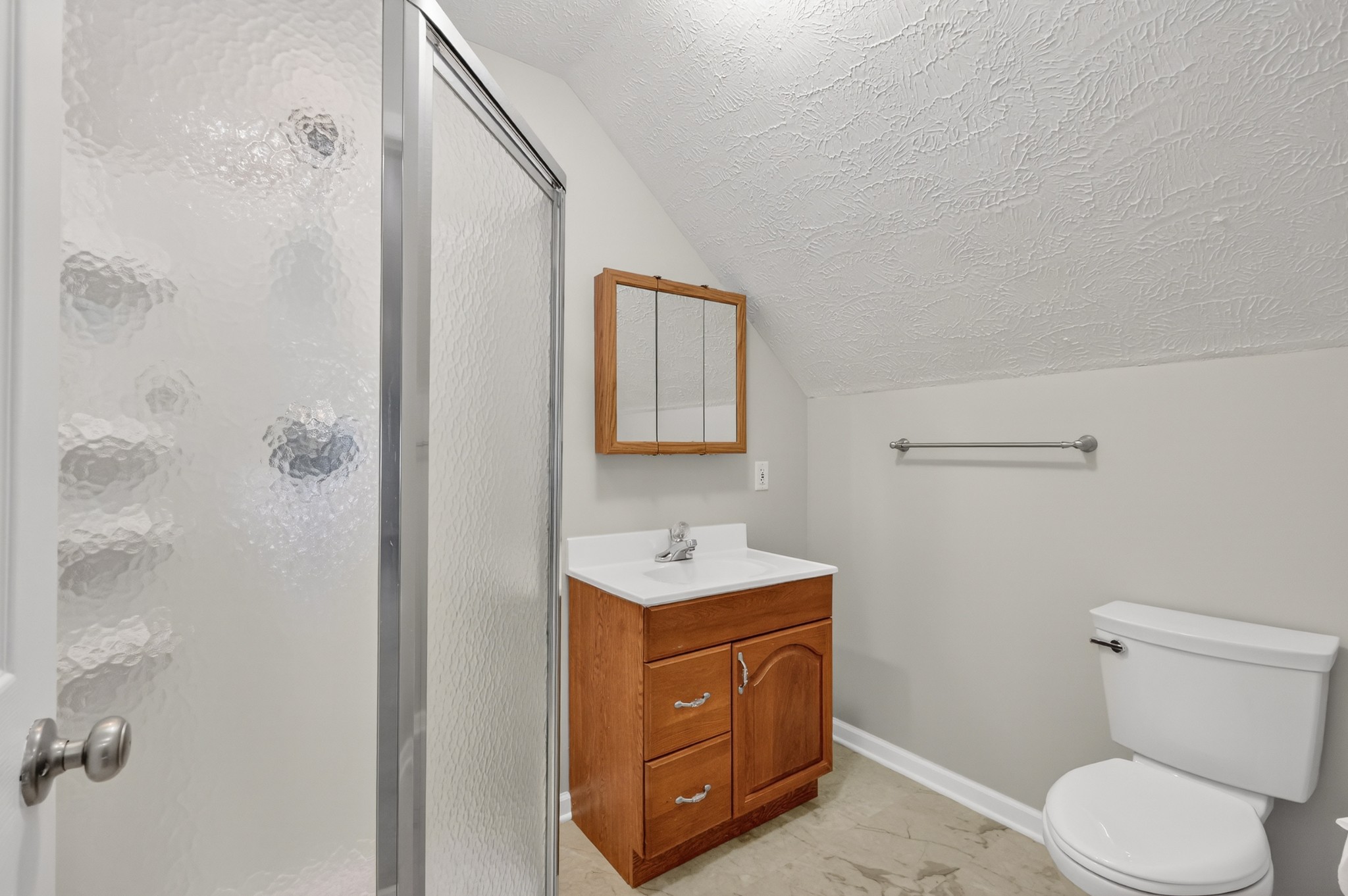 3145 Middleton Drive Rockvale, TN 37153 - Photo 25 of 50 a bathroom with a toilet sink vanity and mirror