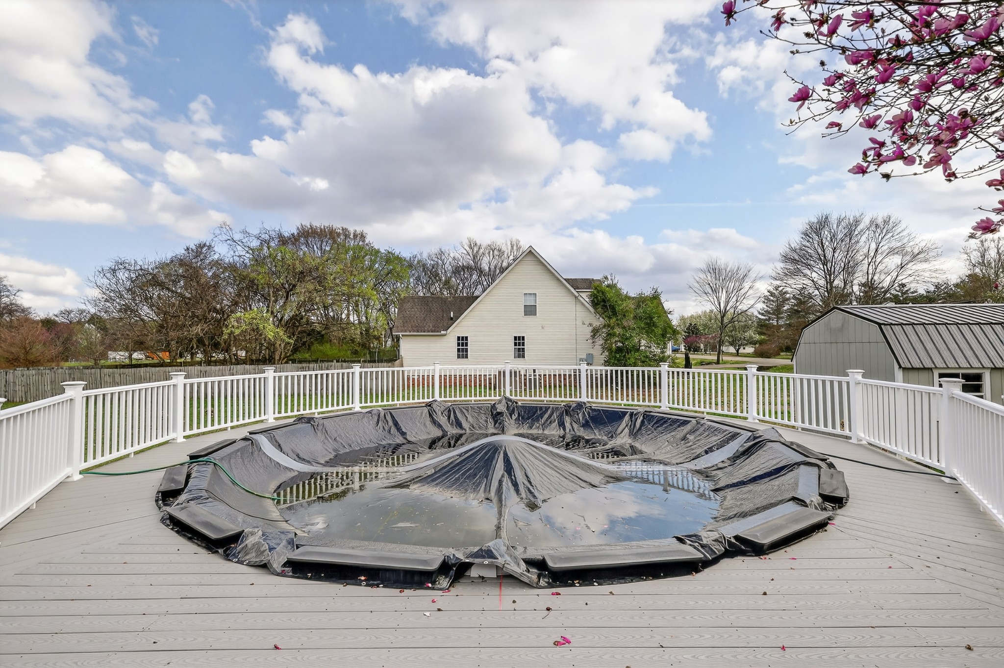 3145 Middleton Drive Rockvale, TN 37153 - Photo 31 of 50 a view of a roof deck with couches and sky view