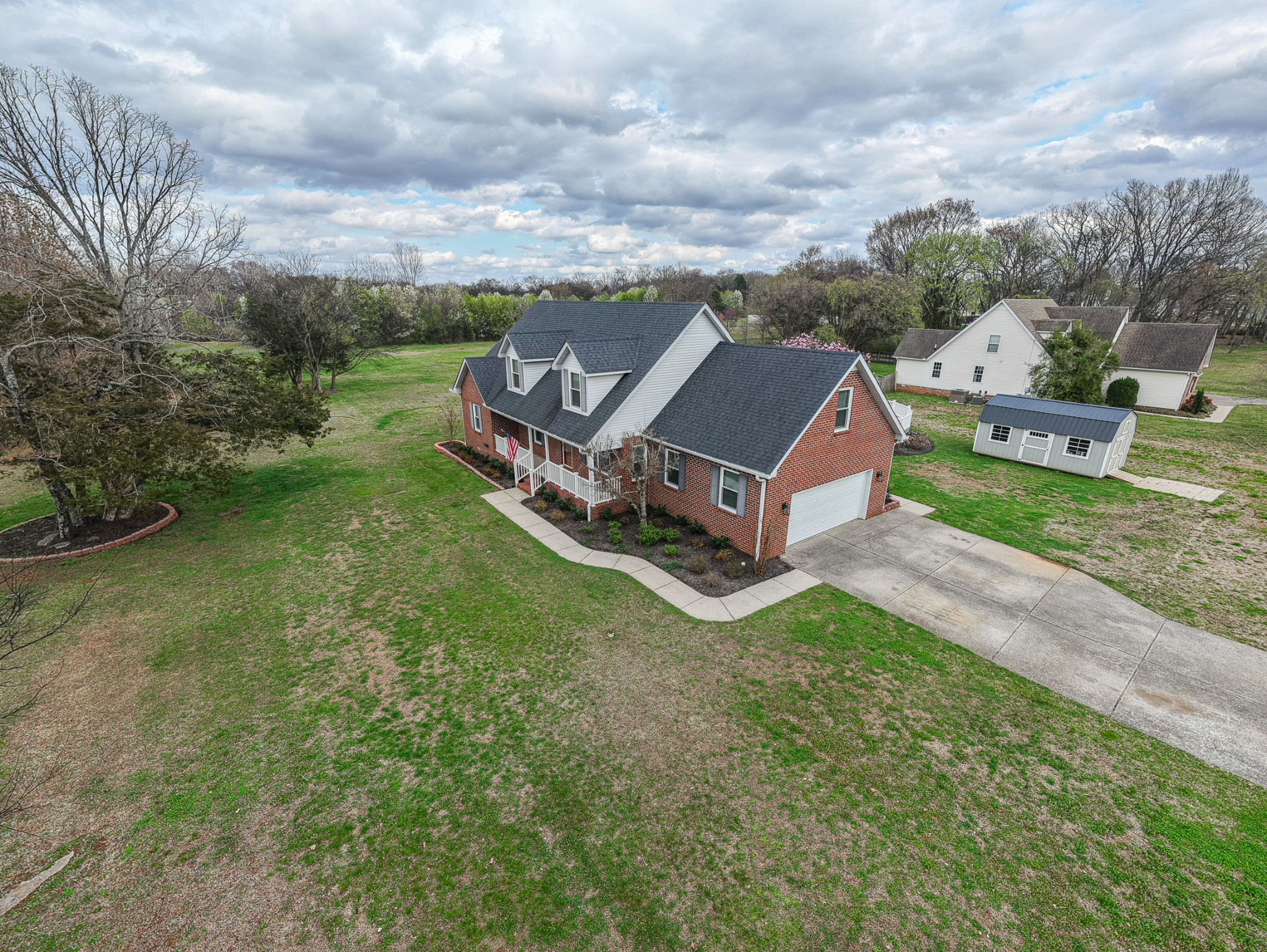 3145 Middleton Drive Rockvale, TN 37153 - Photo 4 of 50 an aerial view of a house with garden space and street view