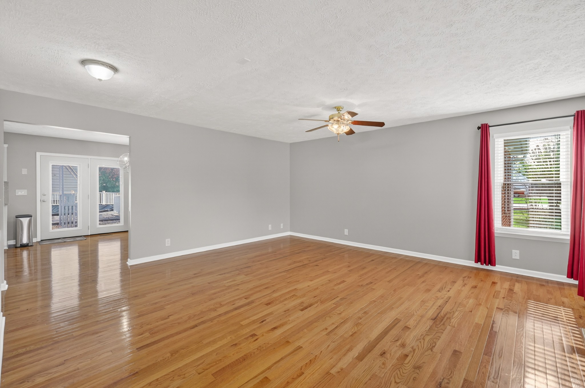 3145 Middleton Drive Rockvale, TN 37153 - Photo 6 of 50 a view of an empty room with wooden floor and a window