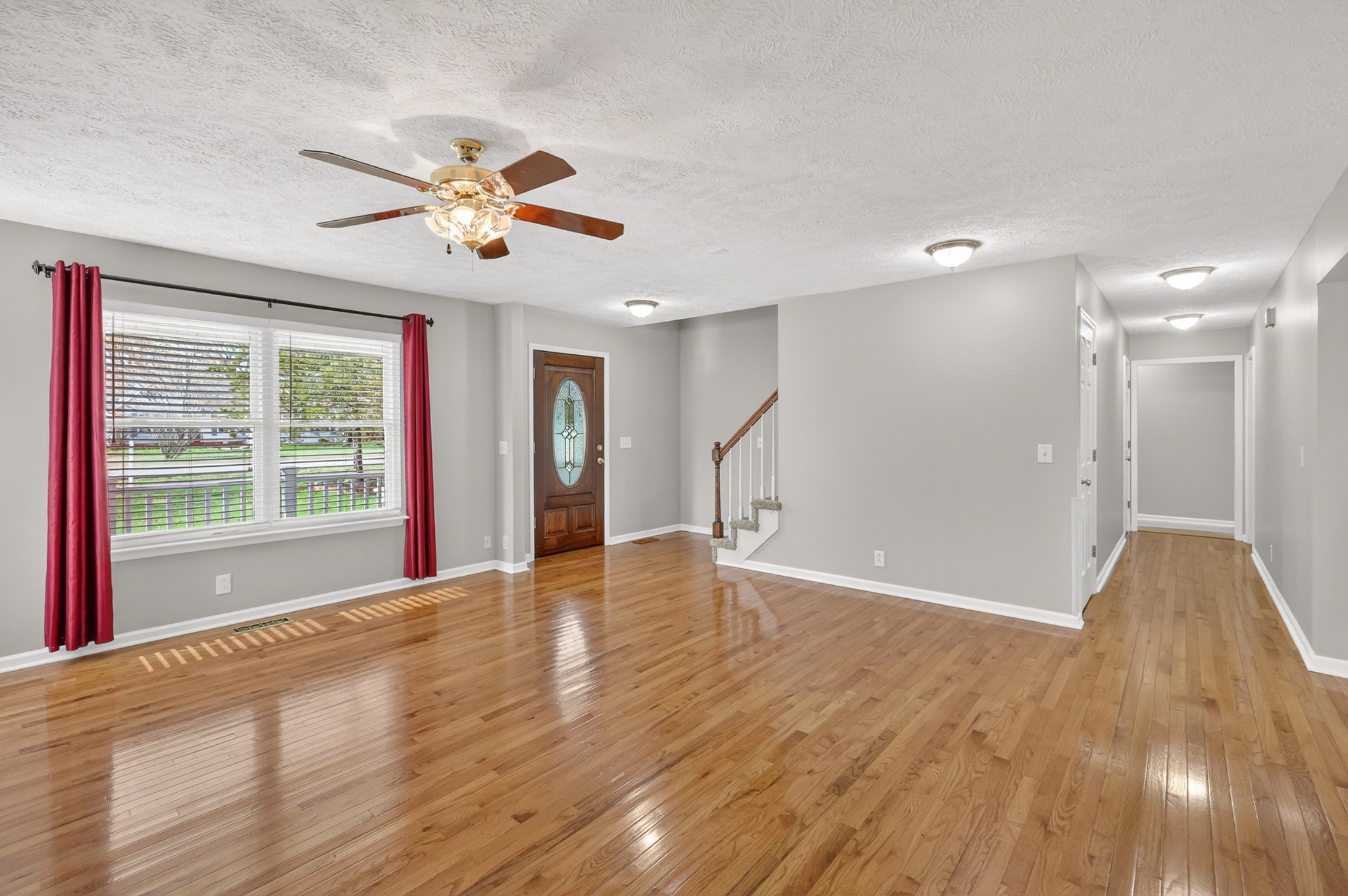 3145 Middleton Drive Rockvale, TN 37153 - Photo 8 of 50 a view of an empty room with window and wooden floor