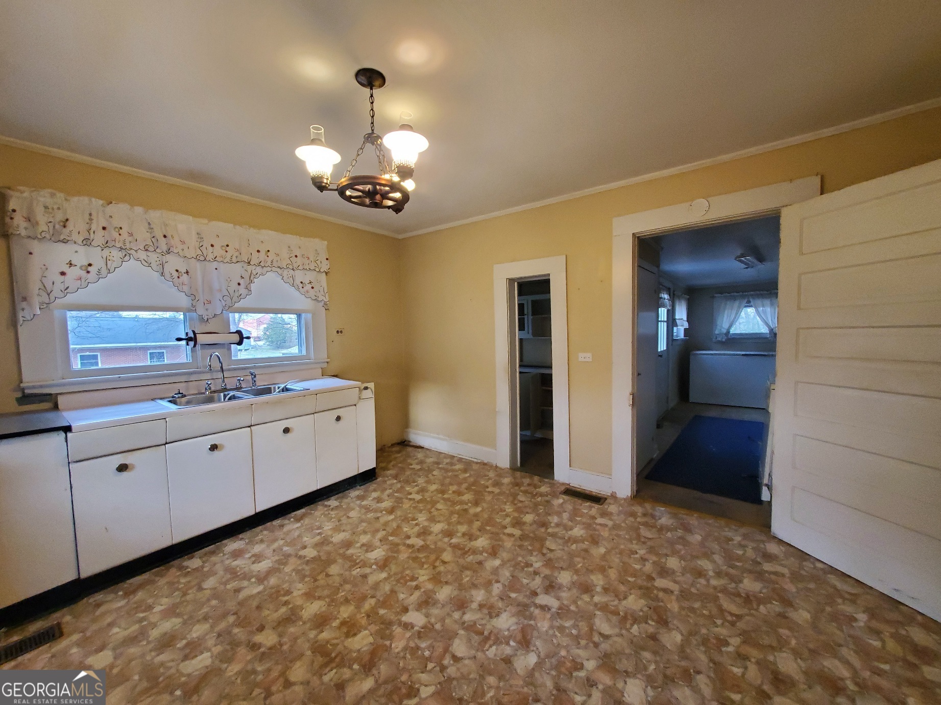 134 Adams Street Lavonia, GA 30553 - Photo 13 of 29 a large bathroom with a sink a mirror and a shower