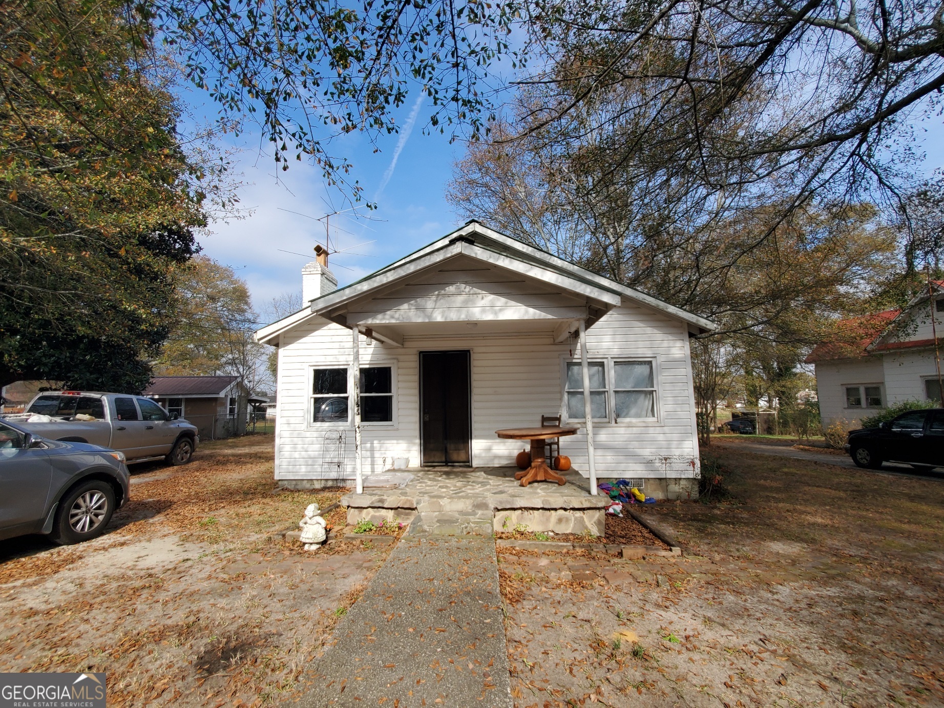 134 Adams Street Lavonia, GA 30553 - Photo 7 of 29 a view of a house with a yard covered in snow