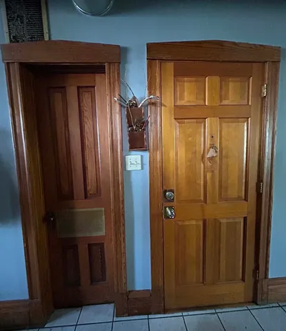 a front view of a house with a garage