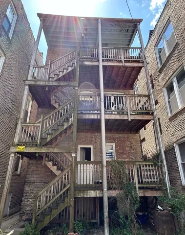 a view of street with wooden bridge