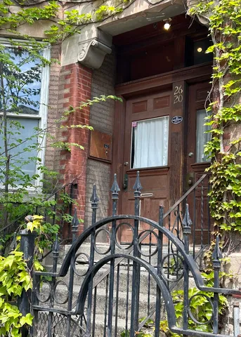 a couple of table and chair in the balcony