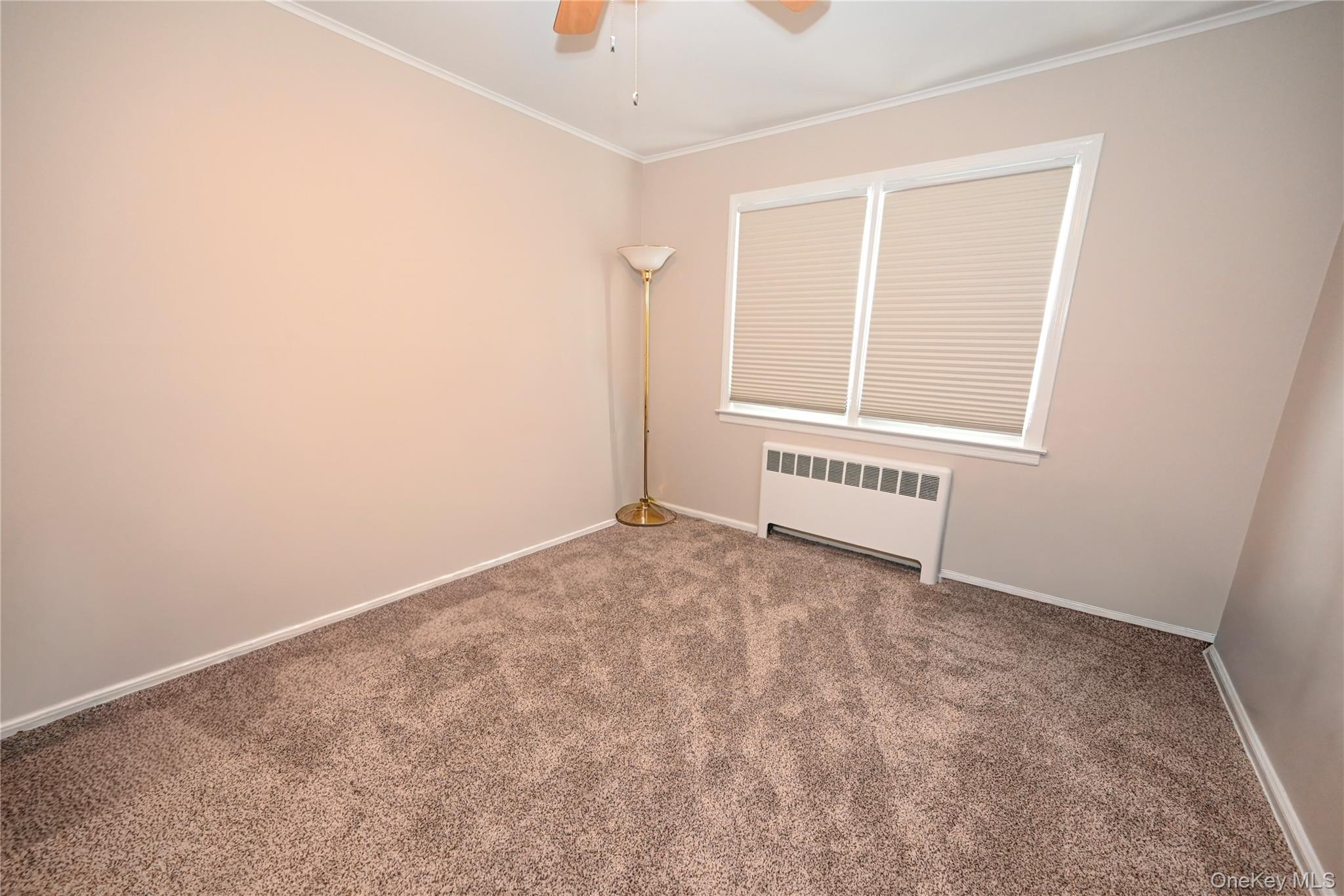 1522 Rica Place Valley Stream, NY 11580 - Photo 14 of 34 an empty room with a window