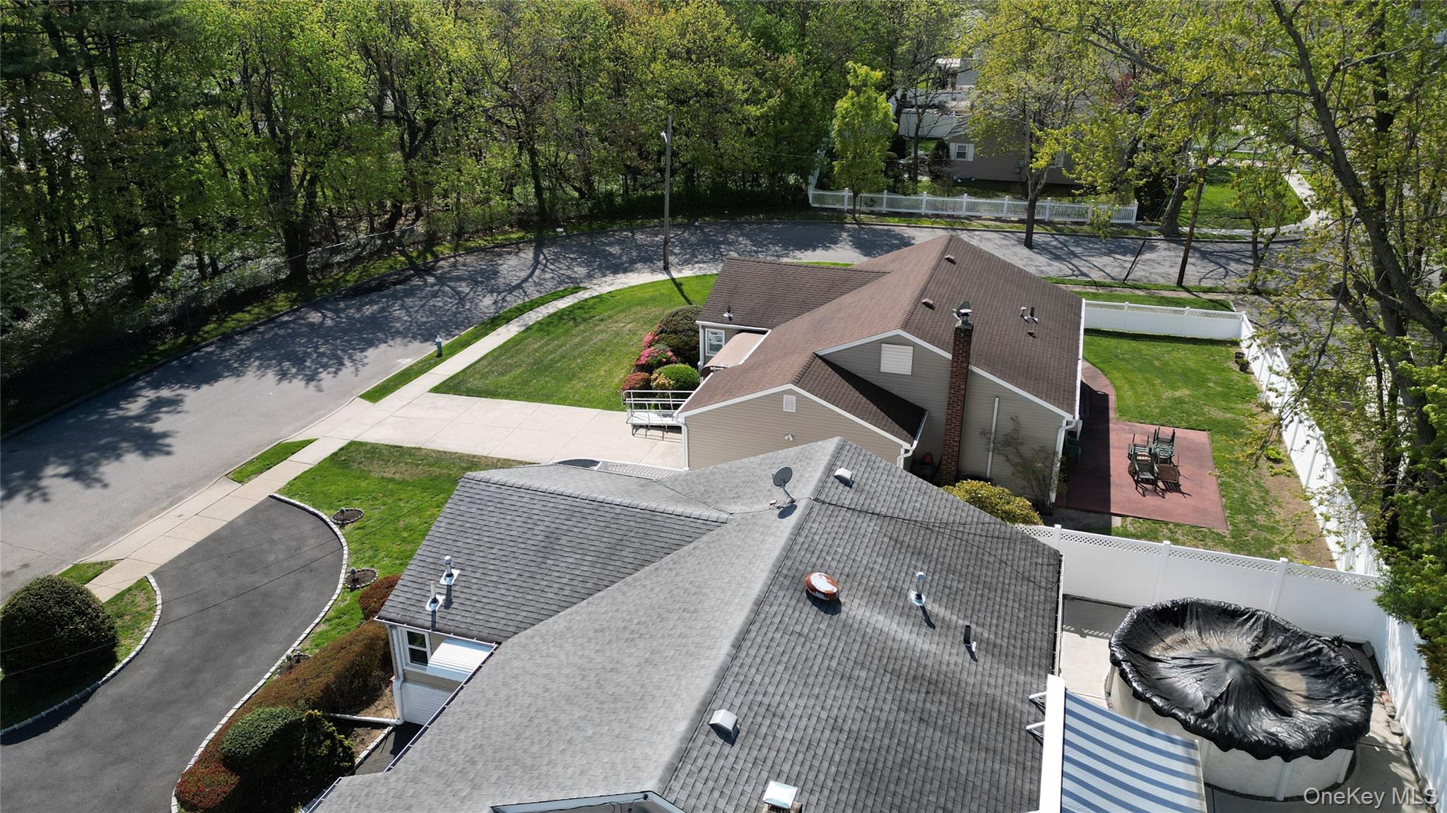 1522 Rica Place Valley Stream, NY 11580 - Photo 27 of 34 an aerial view of a house with garden space and street view