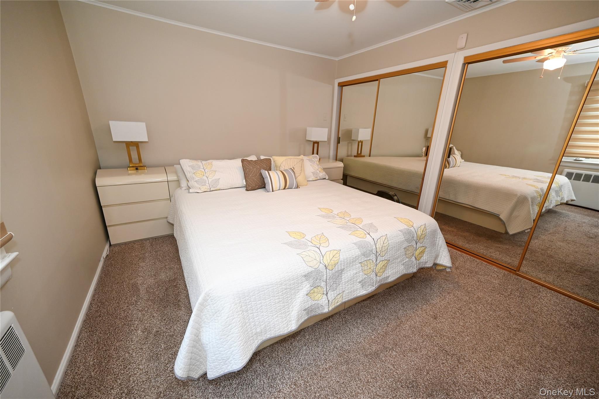 1522 Rica Place Valley Stream, NY 11580 - Photo 10 of 34 a large white bed in a white room