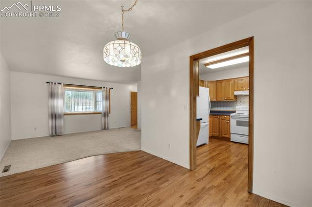 4659 Ridgeglen Road Colorado Springs, CO 80918 - Photo 9 of 40 The wood floors in the dining, kitchen and entry way are in excellent condition and are beautiful!