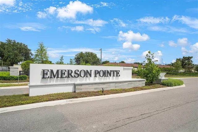 a view of a house with a yard porch and sitting area