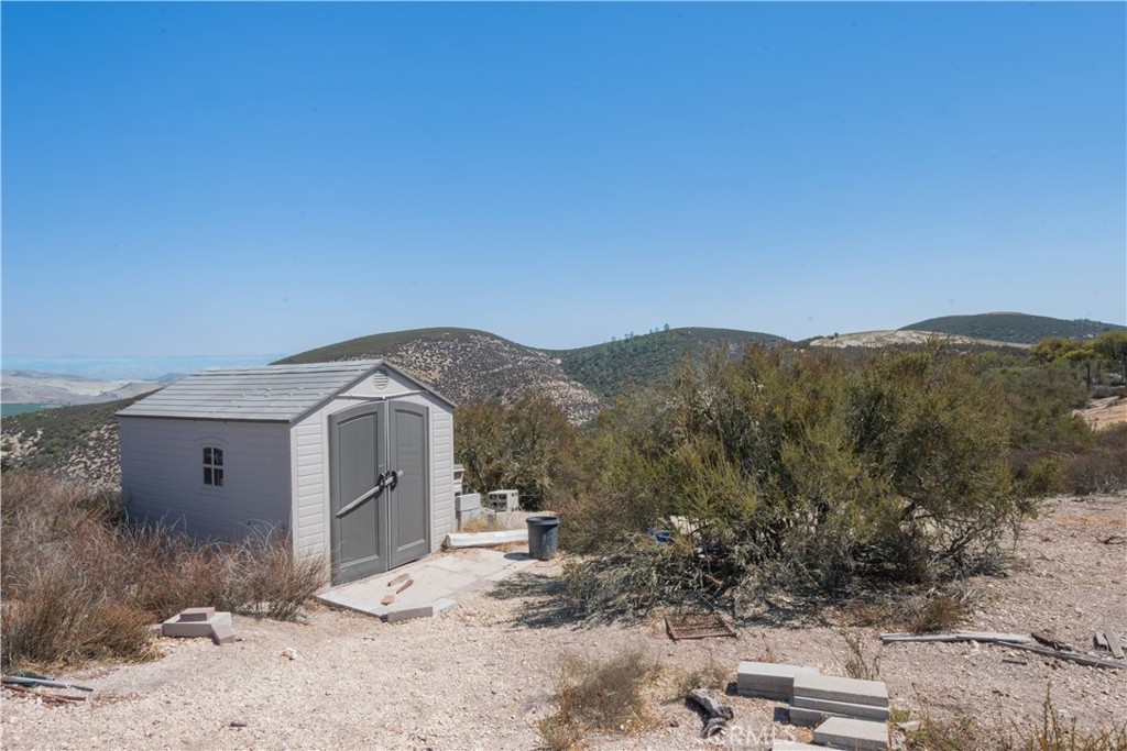 71778 Jolon Road Bradley, CA 93426 - Photo 15 of 18 a view of a house with a outdoor space
