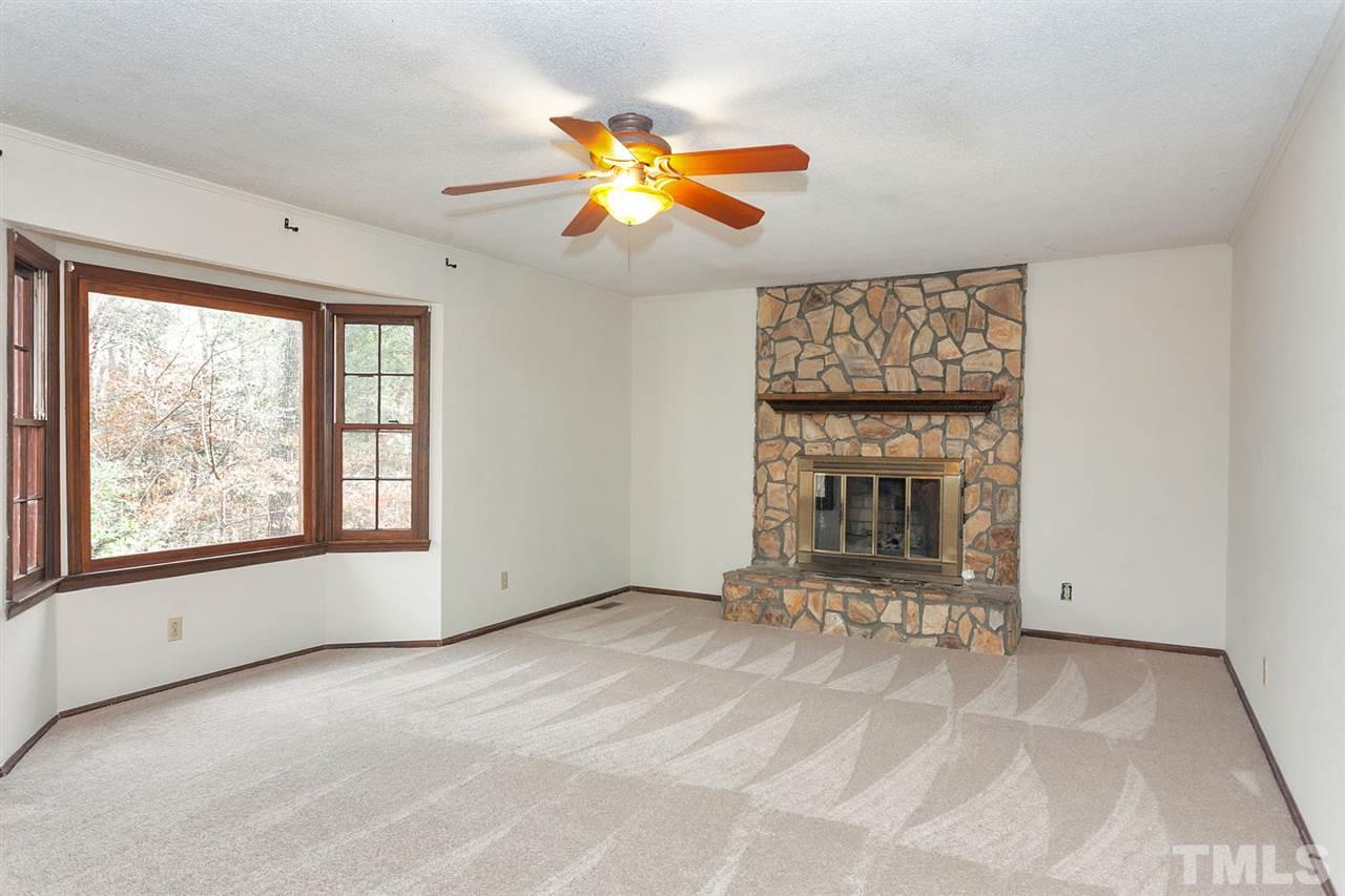 109 Neuse Harbor Drive Raleigh, NC 27610 - Photo 2 of 25 a view of an empty room with a window