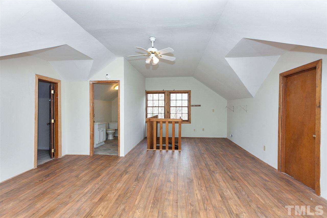 109 Neuse Harbor Drive Raleigh, NC 27610 - Photo 17 of 25 a view of empty room with wooden floor
