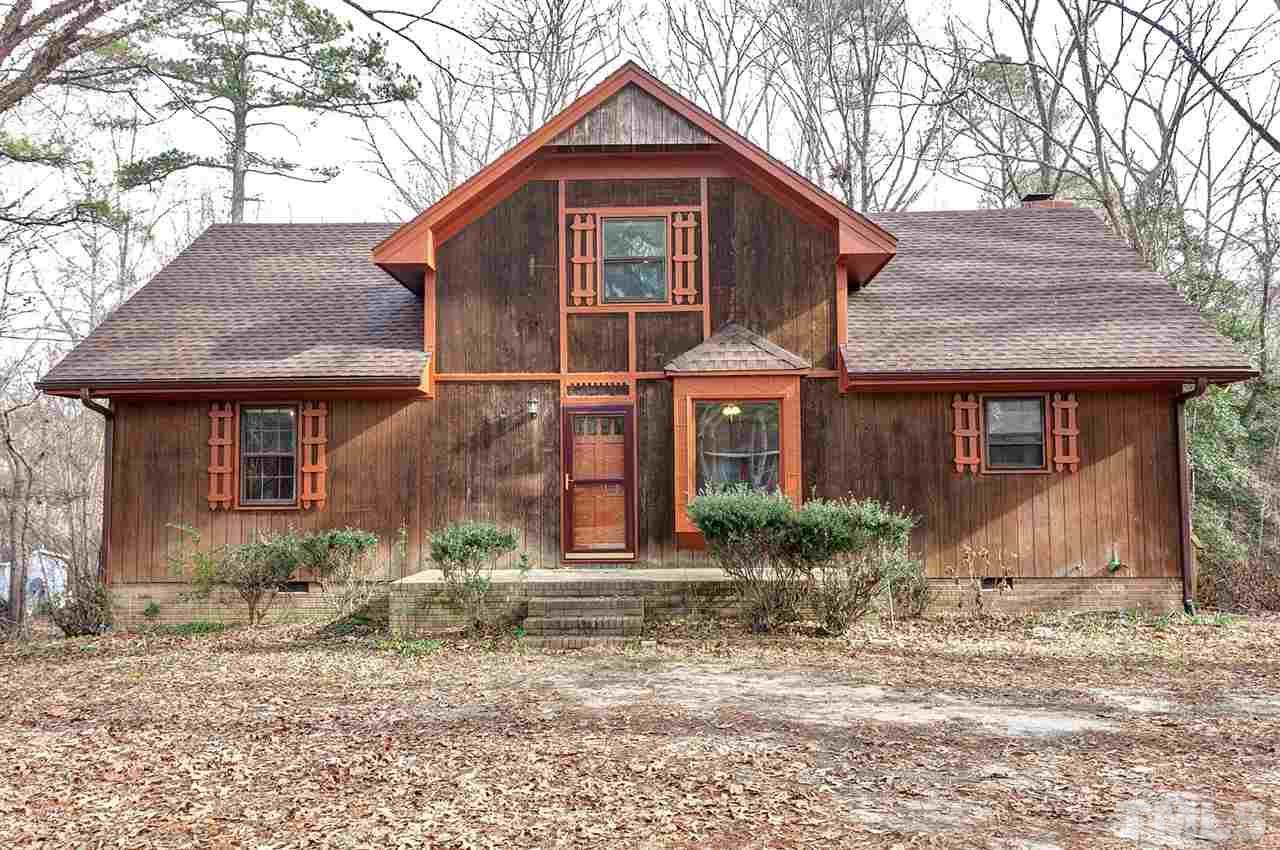 109 Neuse Harbor Drive Raleigh, NC 27610 - Photo 22 of 25 a front view of a house with garden