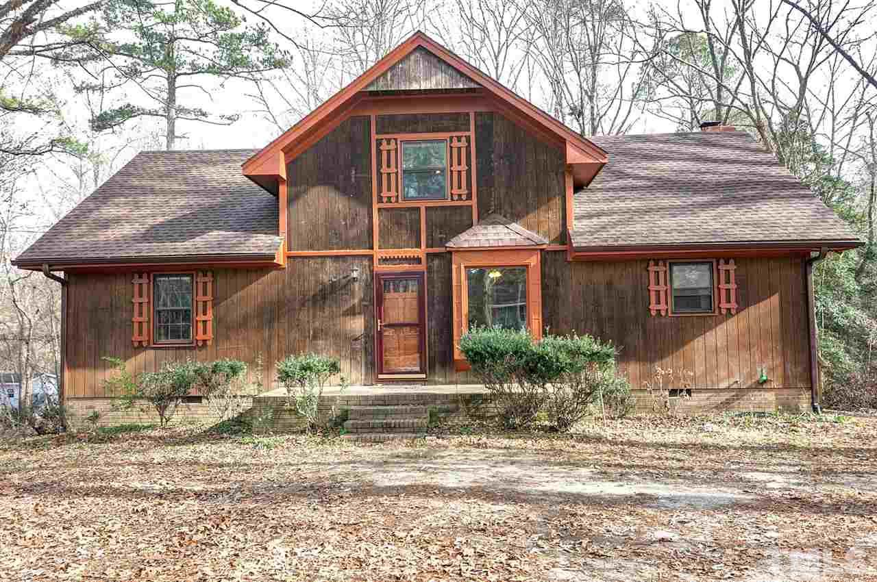 109 Neuse Harbor Drive Raleigh, NC 27610 - Photo 23 of 25 a front view of a house with a yard