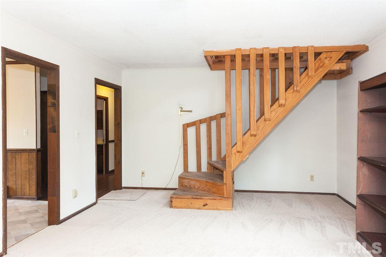 109 Neuse Harbor Drive Raleigh, NC 27610 - Photo 5 of 25 a view of entryway with wooden floor