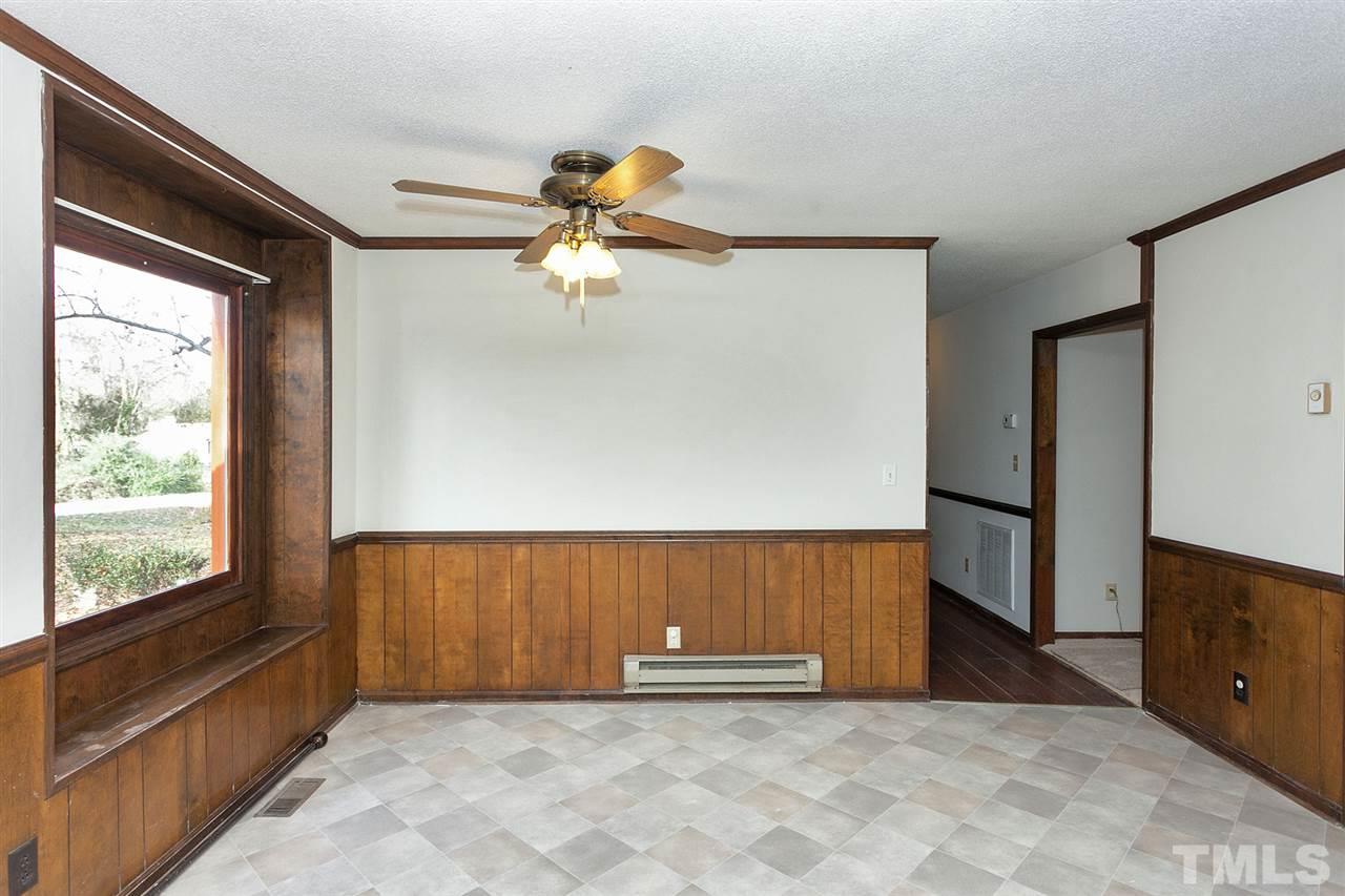 109 Neuse Harbor Drive Raleigh, NC 27610 - Photo 9 of 25 an empty room with windows