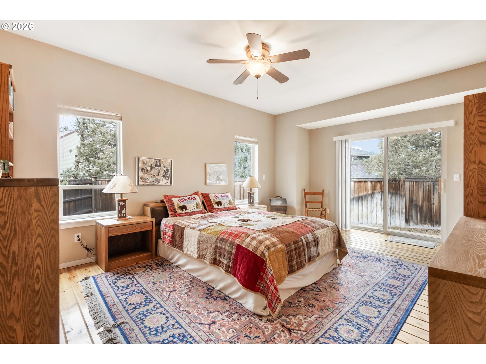 61082 Ferguson Court Bend, OR 97702 - Photo 21 of 48 a bedroom with a large bed and a window