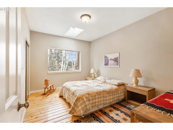 a bedroom with a bed and a view of bathroom