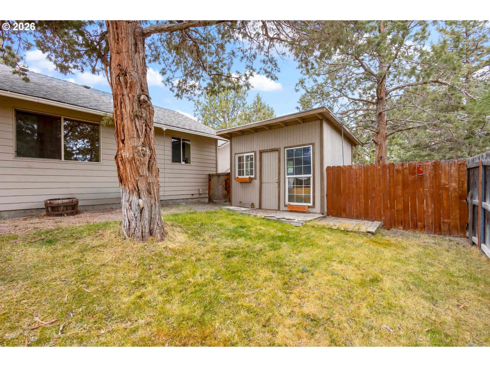 61082 Ferguson Court Bend, OR 97702 - Photo 38 of 48 a house view with a garden space