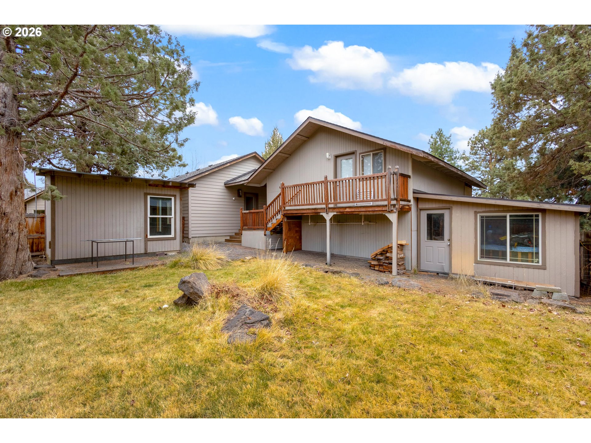 61082 Ferguson Court Bend, OR 97702 - Photo 39 of 48 a view of a house with a yard
