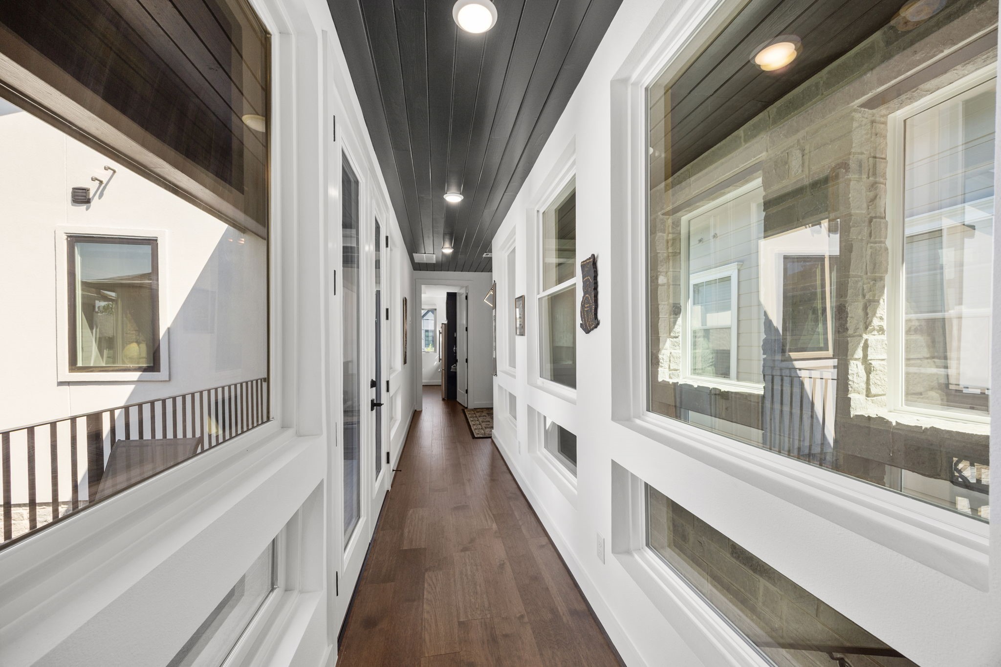 424 Redan Street Houston, TX 77009 - Photo 31 of 47 Bright, inviting hallway leading to the charming casita.