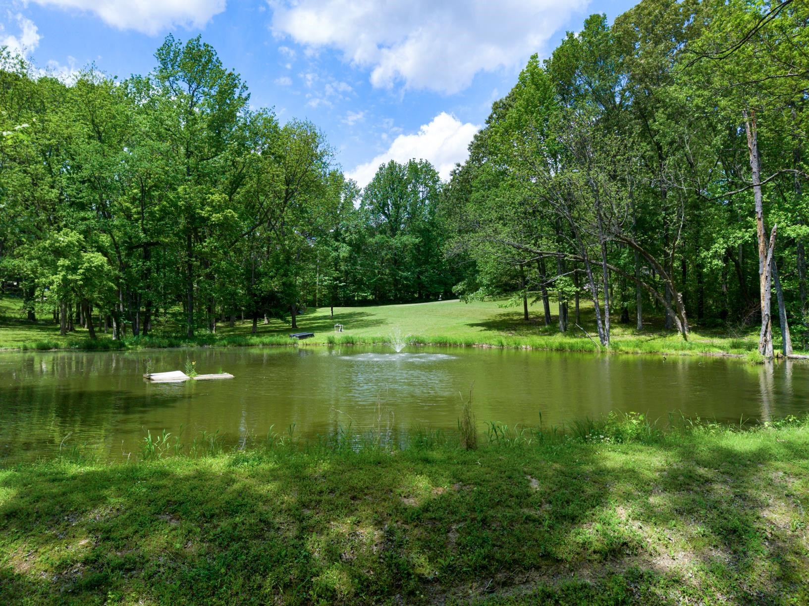 1876 Durhamville Road Ripley, TN 38063 - Photo 2 of 37 a view of a lake view with a garden