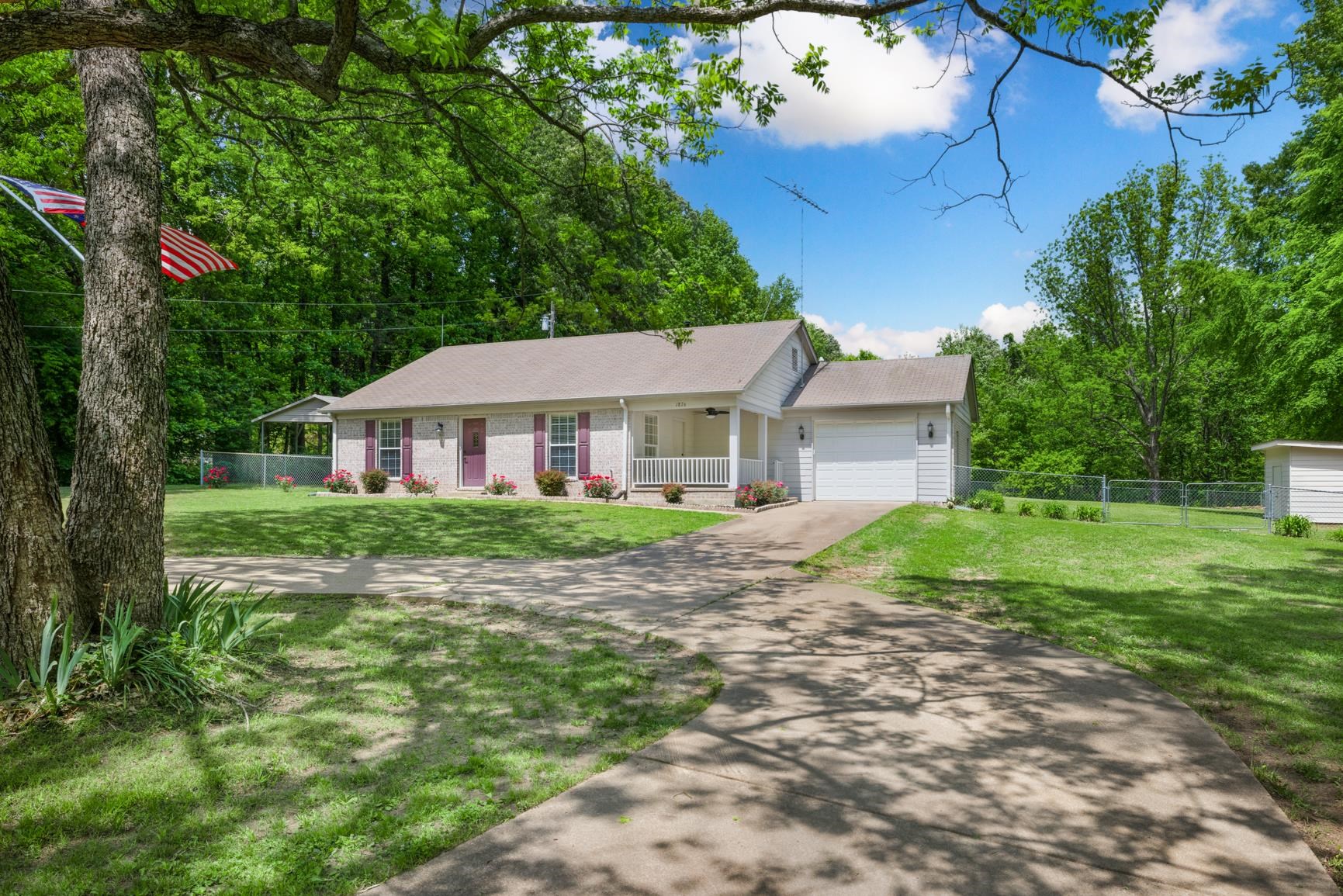 1876 Durhamville Road Ripley, TN 38063 - Photo 23 of 37 a view of house that has a yard