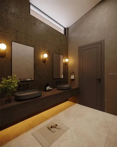 a bedroom with a bed and a view of balcony