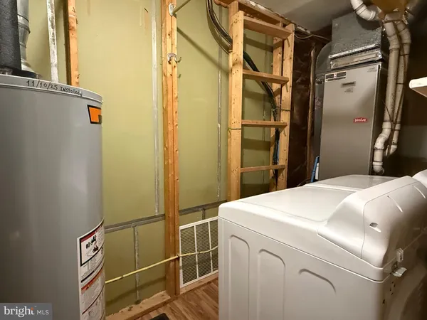 a utility room with dryer and washer