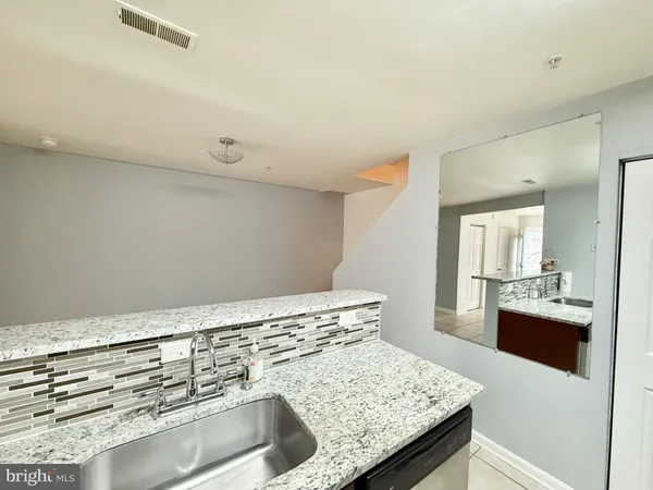 a utility room with washer and dryer