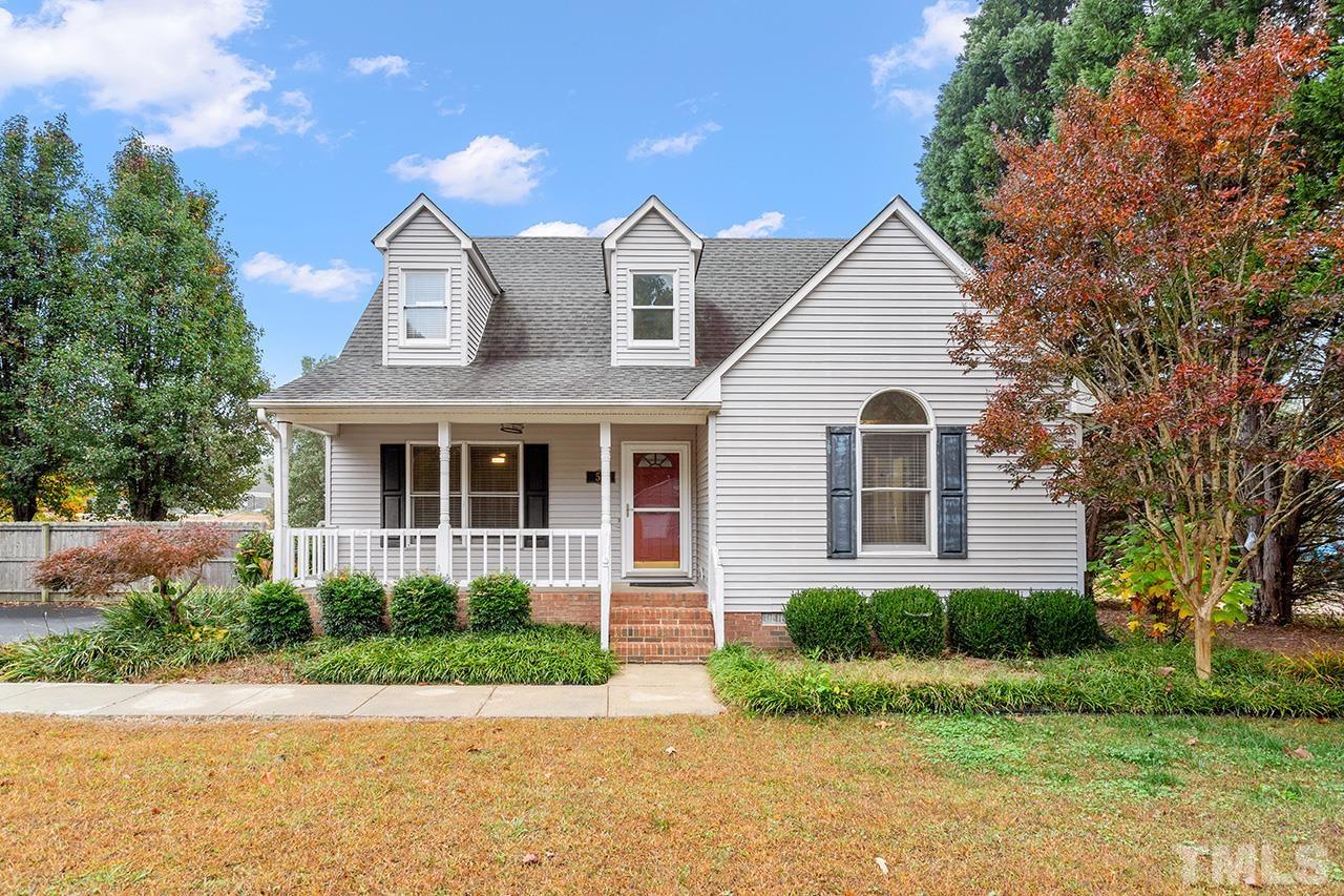 53 Phil Johnson Road Sanford, NC 27330 - Photo 1 of 29 a front view of a house with a yard and potted plants
