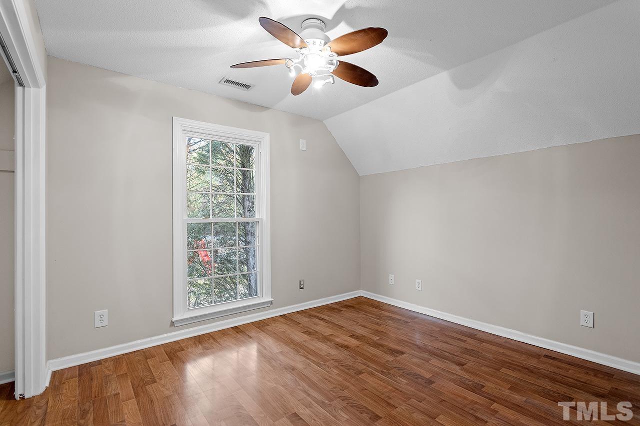 53 Phil Johnson Road Sanford, NC 27330 - Photo 17 of 29 wooden floor in an empty room with a window