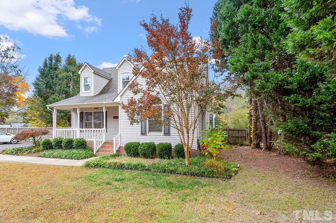 53 Phil Johnson Road Sanford, NC 27330 - Photo 2 of 29 a front view of a house with garden