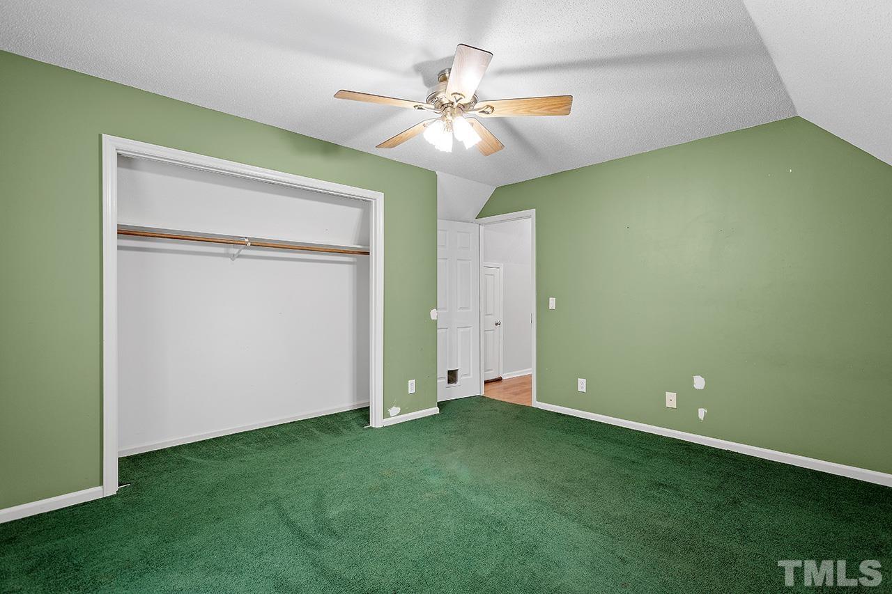 53 Phil Johnson Road Sanford, NC 27330 - Photo 21 of 29 a view of an empty room with a chandelier fan