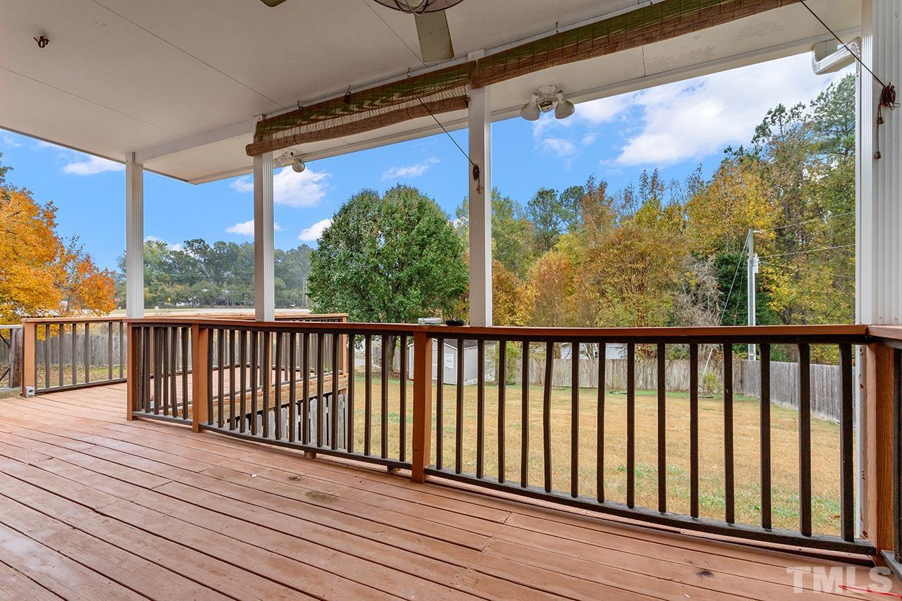 53 Phil Johnson Road Sanford, NC 27330 - Photo 24 of 29 a view of a balcony with wooden floor