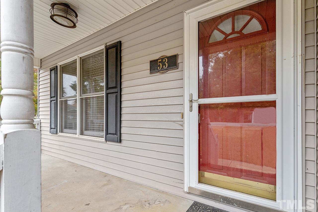 53 Phil Johnson Road Sanford, NC 27330 - Photo 3 of 29 a view of front door of a house