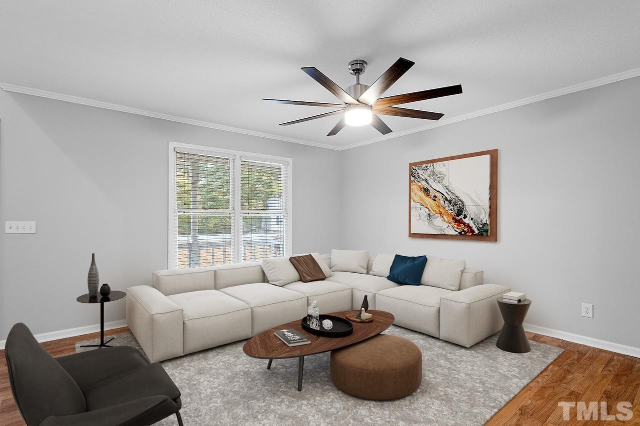 53 Phil Johnson Road Sanford, NC 27330 - Photo 6 of 29 a living room with furniture and a large window