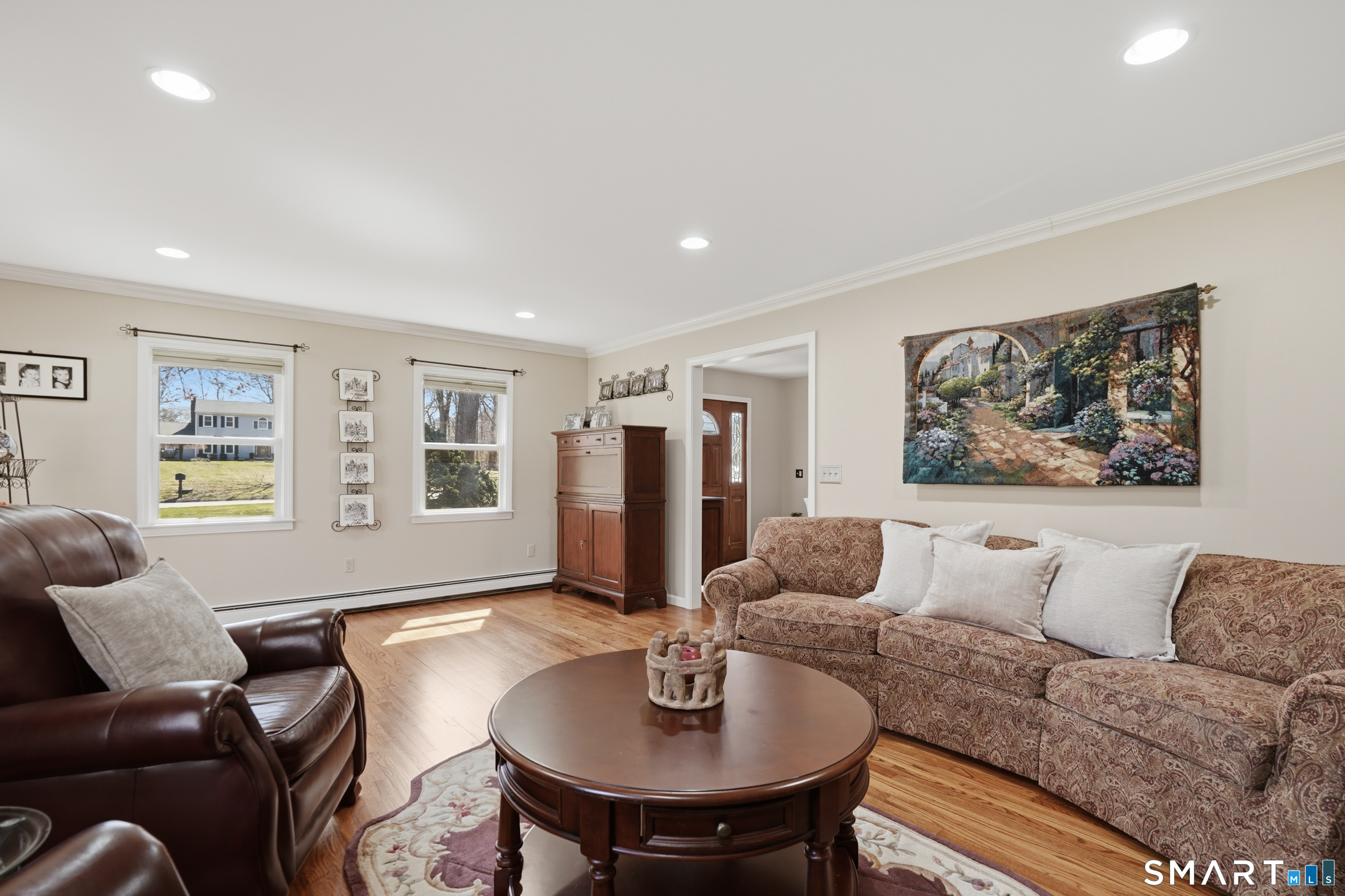 21 Shawnee Lane Monroe, CT 06468 - Photo 11 of 43 a living room with furniture and a window