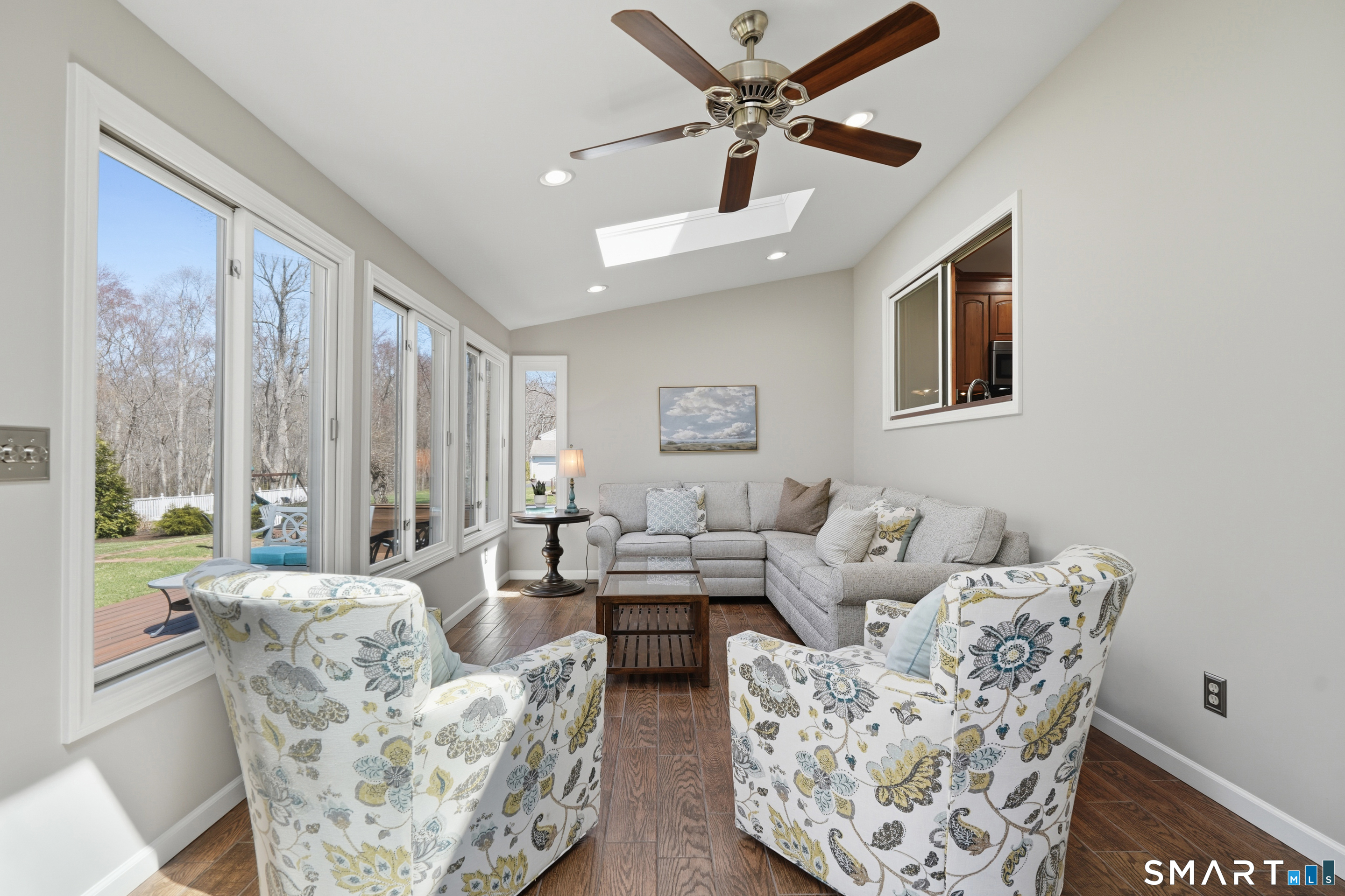 21 Shawnee Lane Monroe, CT 06468 - Photo 17 of 43 a living room with furniture and a large window