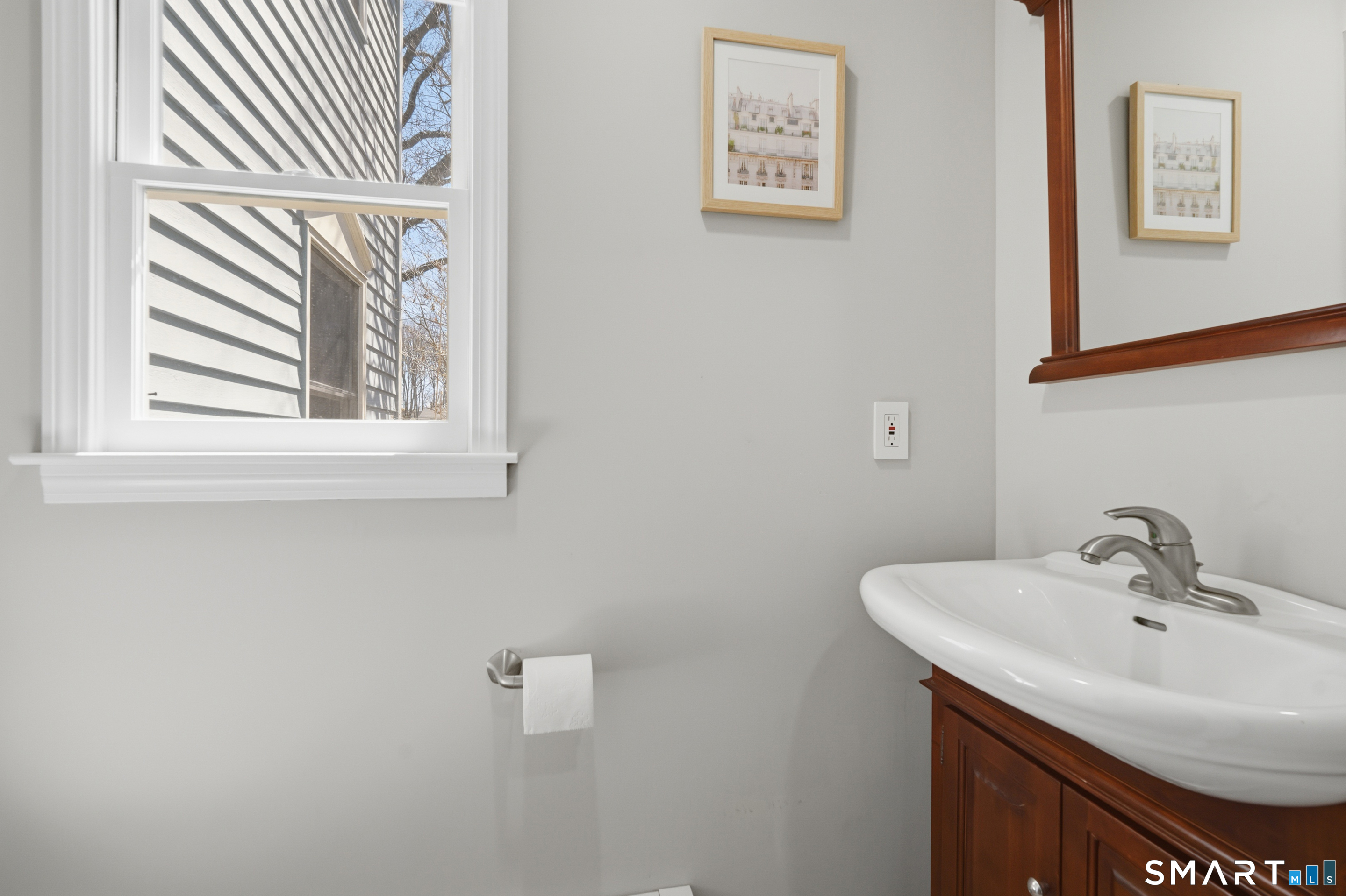 21 Shawnee Lane Monroe, CT 06468 - Photo 23 of 43 a bathroom with a sink and a mirror