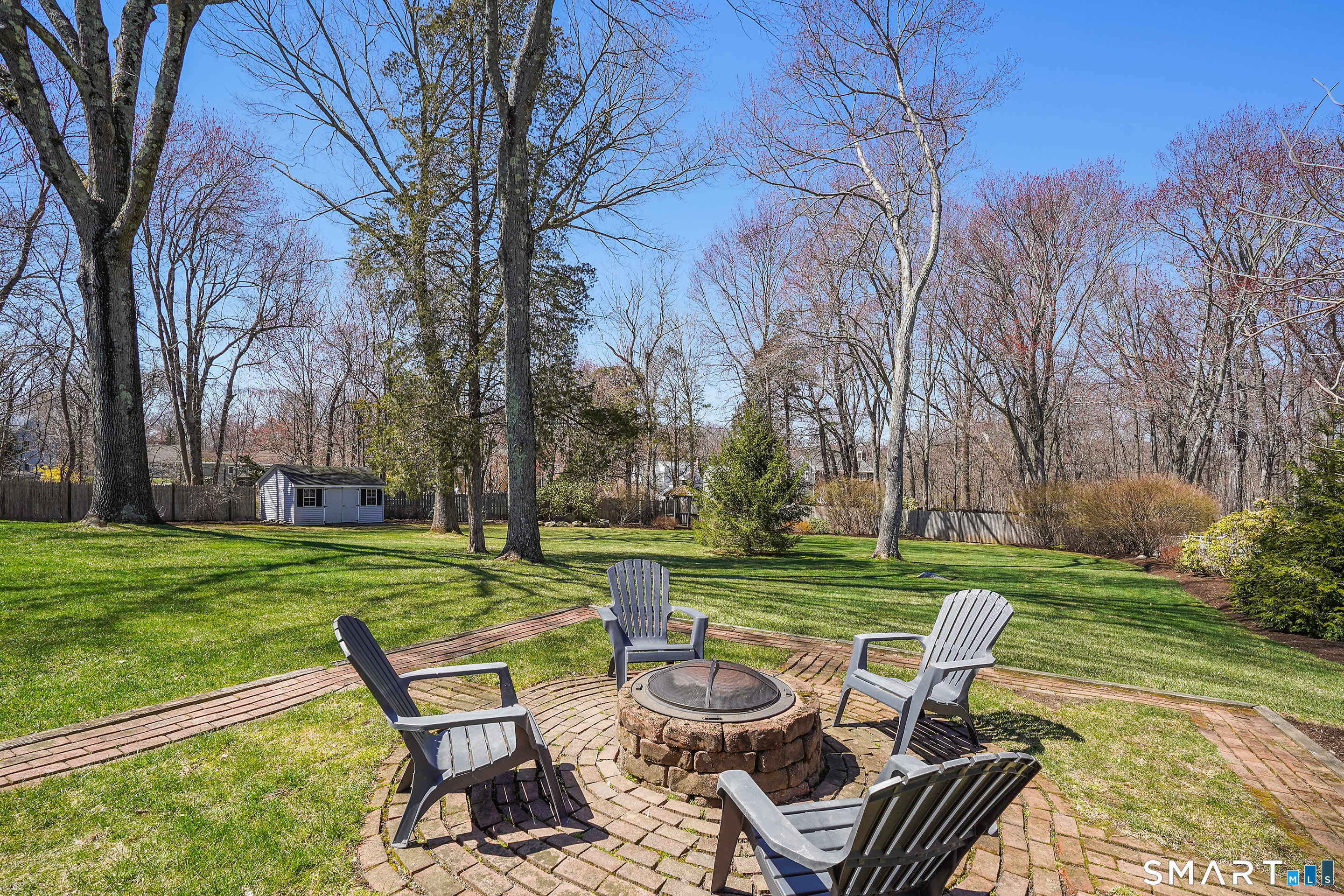 21 Shawnee Lane Monroe, CT 06468 - Photo 35 of 39 a view of a chairs and table in the yard
