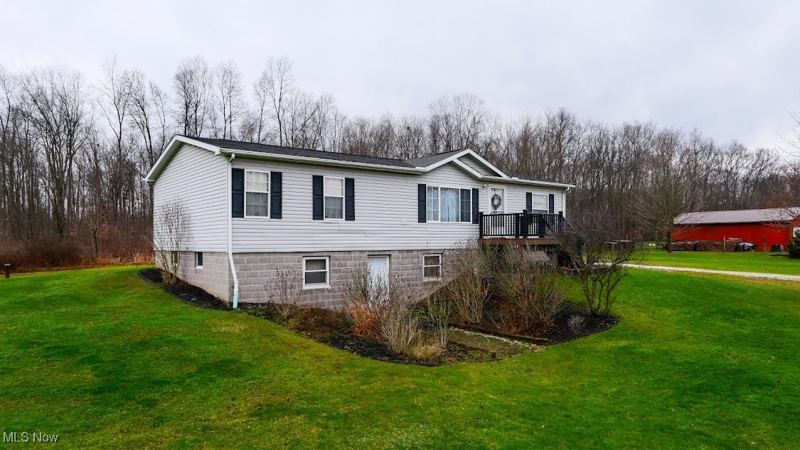 17296 Old State Road Middlefield, OH 44062 - Photo 1 of 44 View of front of property with a deck and a front yard