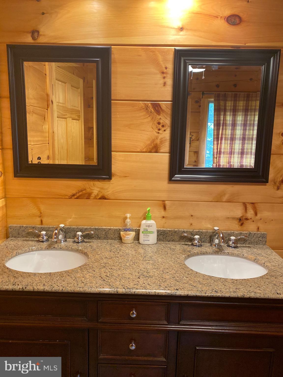 550 Cross Mountain Road Luray, VA 22835 - Photo 3 of 14 a bathroom with sinks and mirror