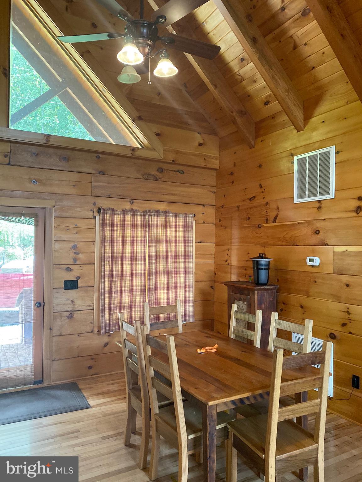550 Cross Mountain Road Luray, VA 22835 - Photo 4 of 14 a view of a dining room with furniture and wooden floor