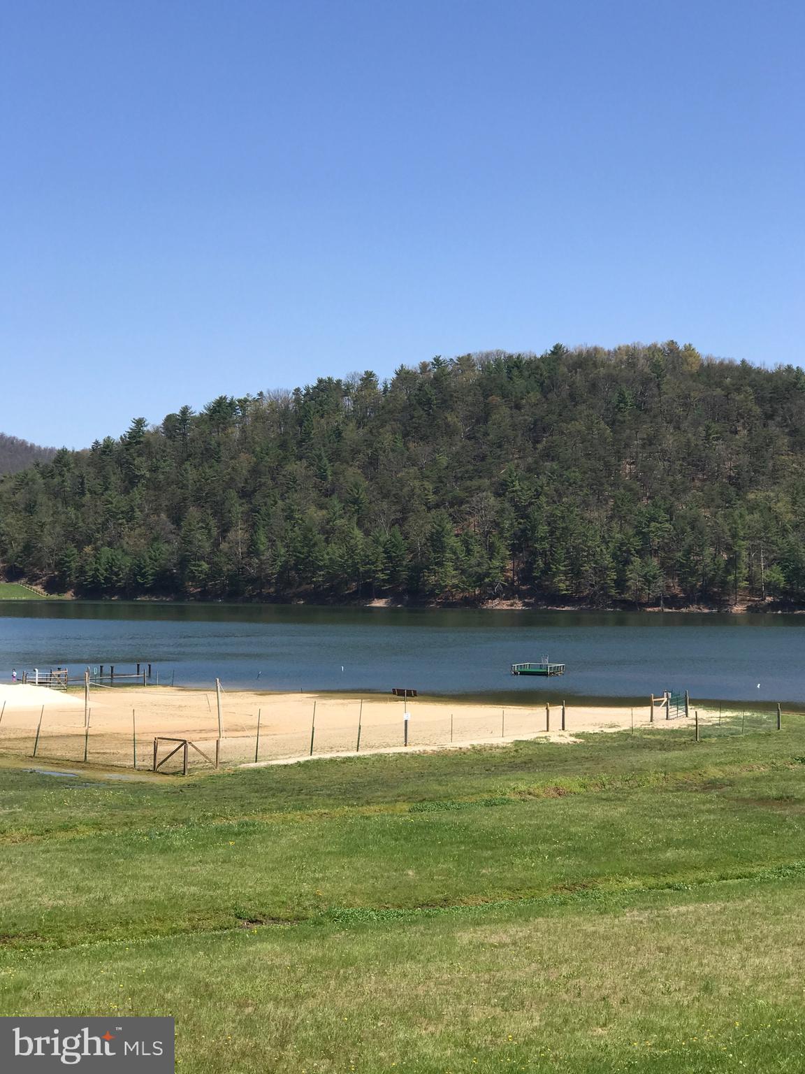 550 Cross Mountain Road Luray, VA 22835 - Photo 9 of 14 a view of a lake from a yard
