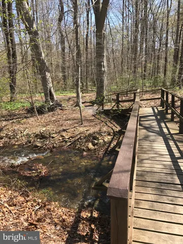 a view of a backyard of the house