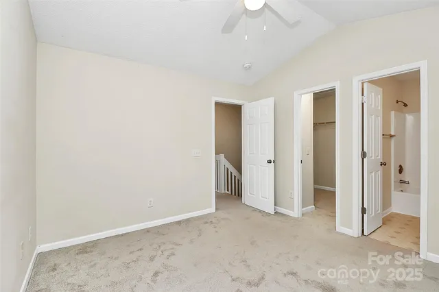 an empty room with a bathroom